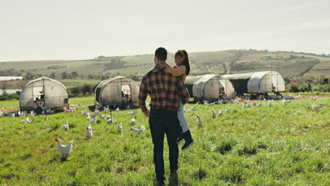 father carry daughter on farm