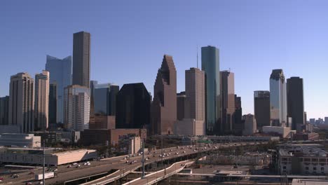 4k-aerial-view-of-downtown-Houston-and-I-45-North-and-South-Freeway