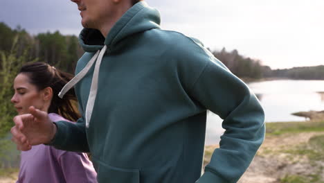 Couple-running-in-the-forest