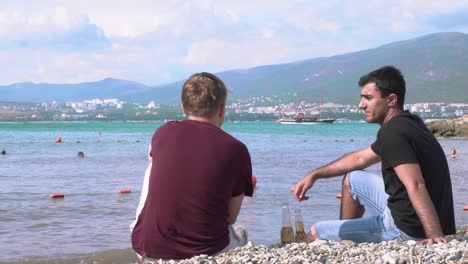 two friends enjoying a sunny beach day