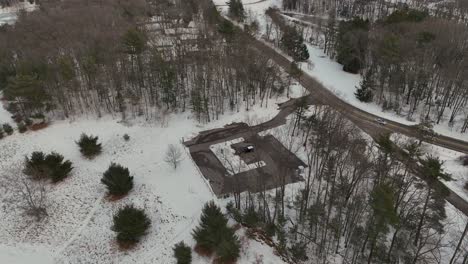 A-parking-lot-nestled-among-trees-in-a-small-town