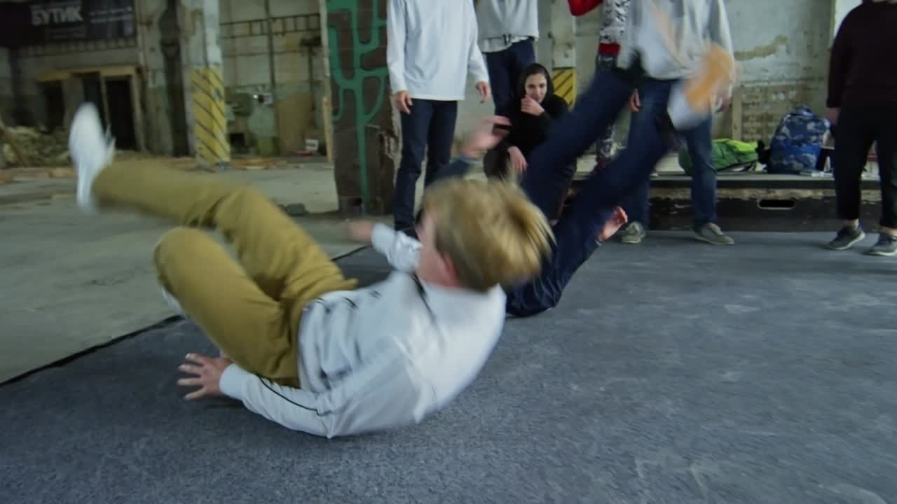 Two Teenagers Doing Capoeira Dancing
