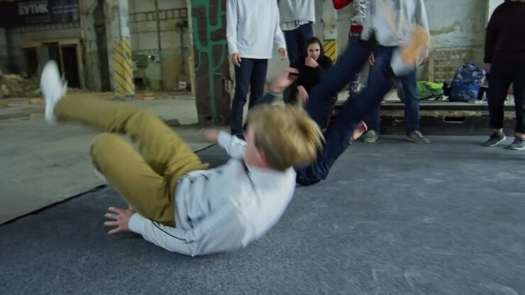 Two Teenagers Doing Capoeira Dancing