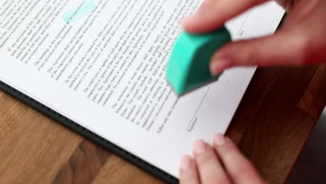 approved business document with hand