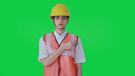 indian female architect explaining the work to employees green screen