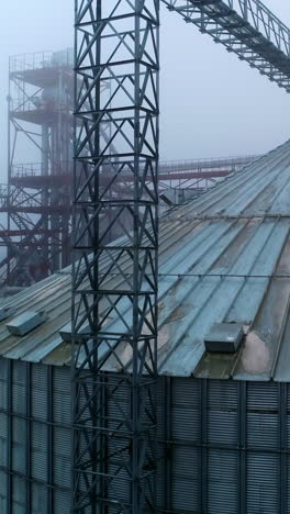big elevator storage construction. metal building container storehouse. vertical video