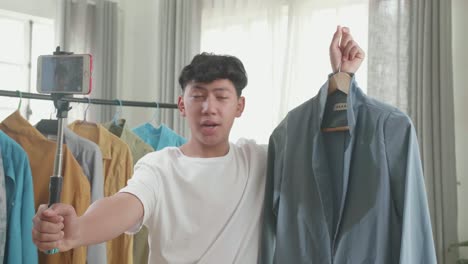 teenager shows clothes on social media
