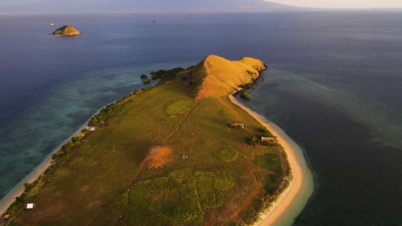 Aerial View of a Secluded Tropical Island at Sunrise