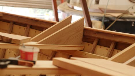 rough oak knees in wood boat under construction