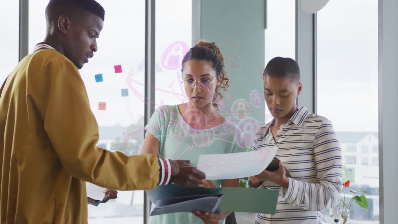 Reviewing documents, diverse team with digital network animation overlay in office