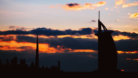 dubai skyline silhouette at sunset