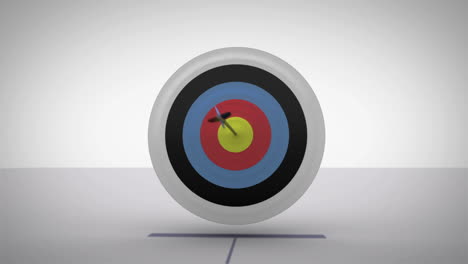 Arrow-flying-towards-dart-board-and-hitting-target