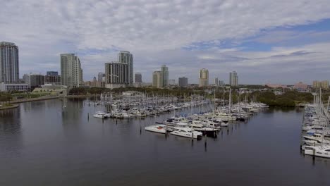 4K-Aerial-Drone-Video-of-Sailboats-at-Marina-on-Tampa-Bay-and-Skyline-of-High-rise-Condos-in-Downtown-St