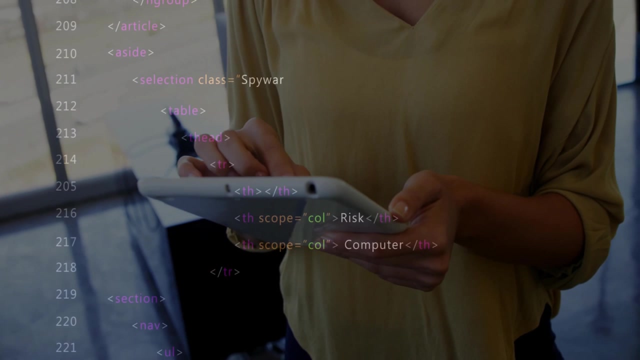 IT professional tapping tablet and scrolling stylus in lobby, exploring cybersecurity term overlays