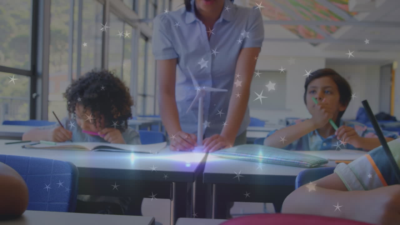 animación de estrellas sobre diversos escolares que escriben