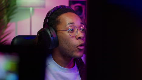 young man playing video games