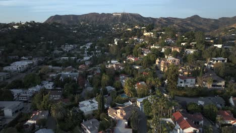 aerial drone flyover famous hollywood hills neighborhood, los angeles, california