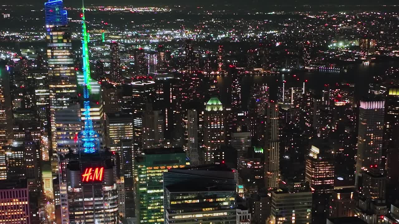 Stunning aerial view of New York City skyline at night captured from drone