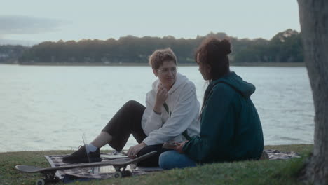 girls sitting in the park and chatting