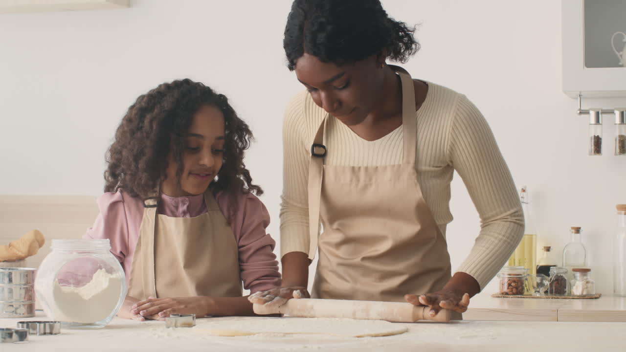 Mother and Daughter Baking Cookies