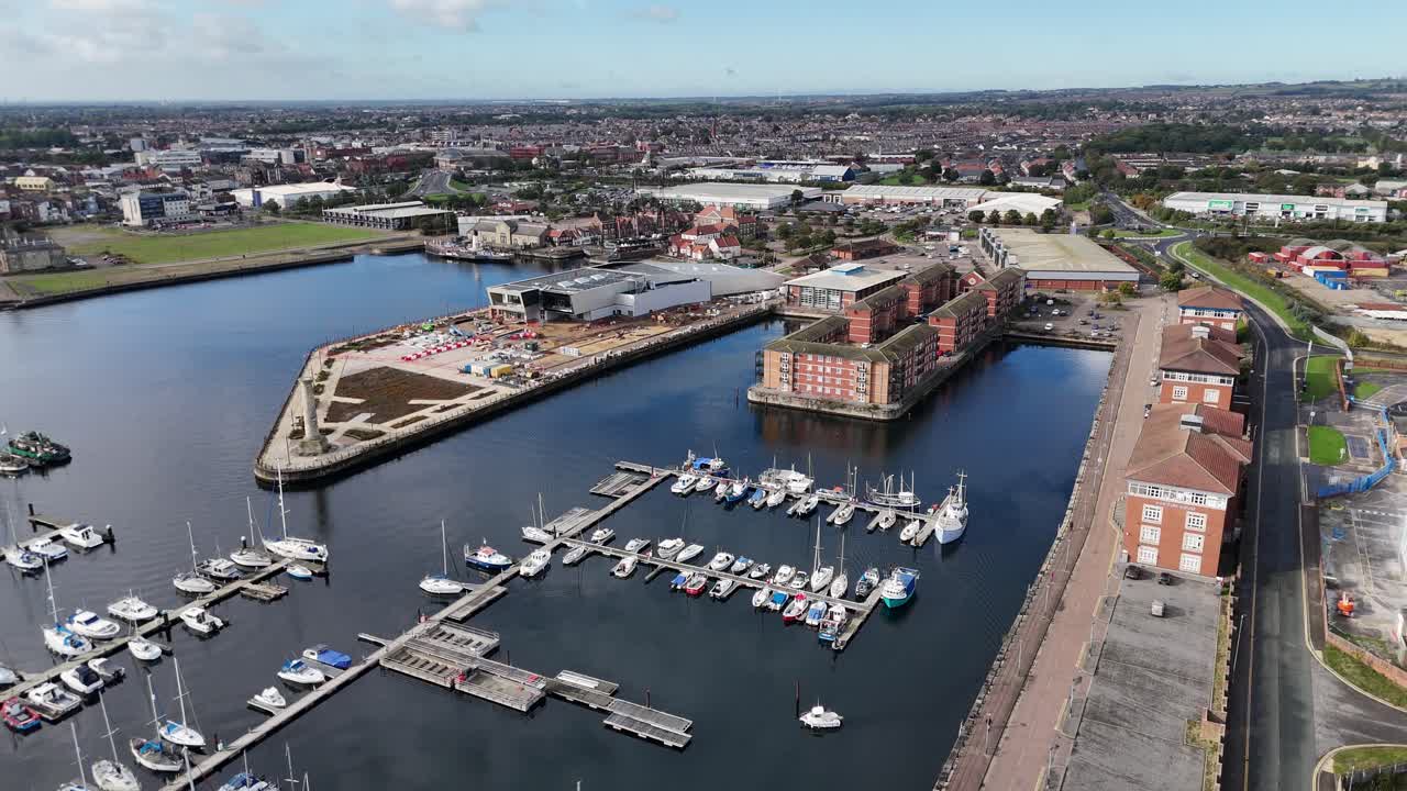 Aerial drone video Hartlepool marina harbour port beach coastal town County Durham North East England UK