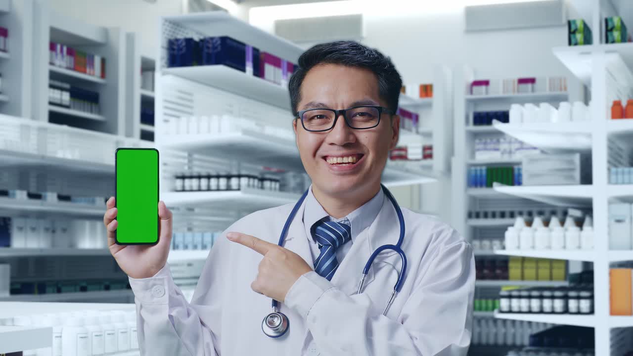 의사는 약국에서 녹색 화면 전화를 제시합니다.