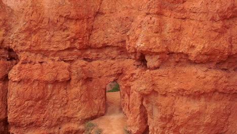 tilt down from bryce canyon rock formations to rock passage way on trail