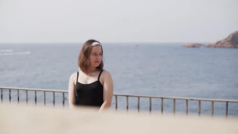 young delightful girl observe magical and unbelievable sea landscape