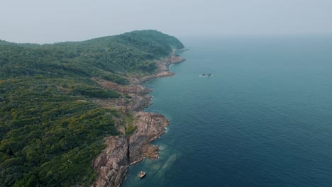 aerial shot of tropical island with crystal clear sea