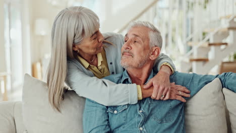 affectionate senior couple embracing at home