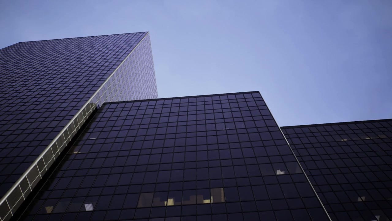Torre per uffici contemporanea che riflette il cielo al tramonto con estetica minimalista