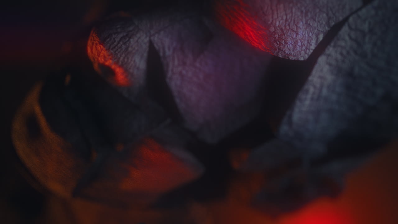 Crushed android head on spikes in hell