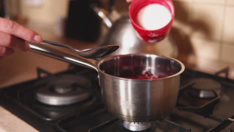 making raspberry jam