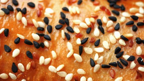close-up of a bread topping with sesame seeds