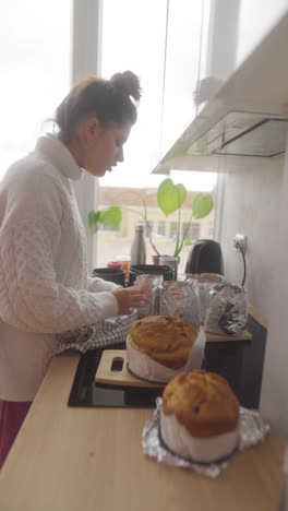 Woman Baking Easter Bread in a Kitchen