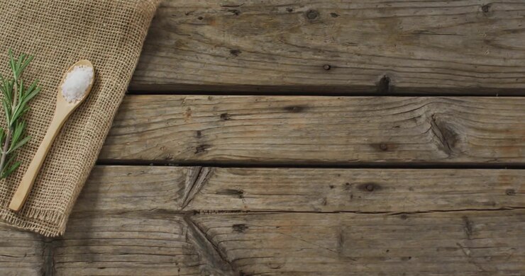 Social Media Notifications Overlaying Rustic Cooking Ingredients on Wooden Table