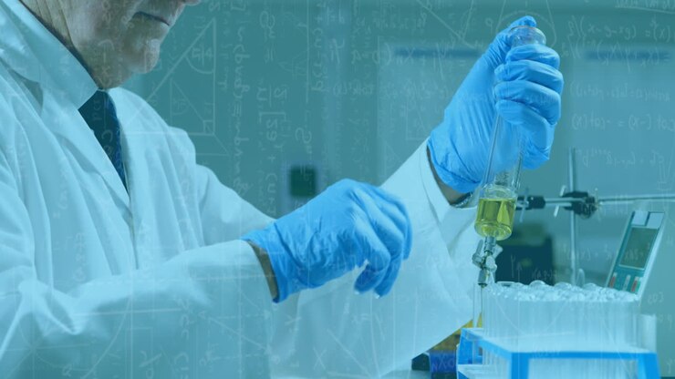 Animation of mathematical and scientific formulae over male scientist using test tubes in laboratory