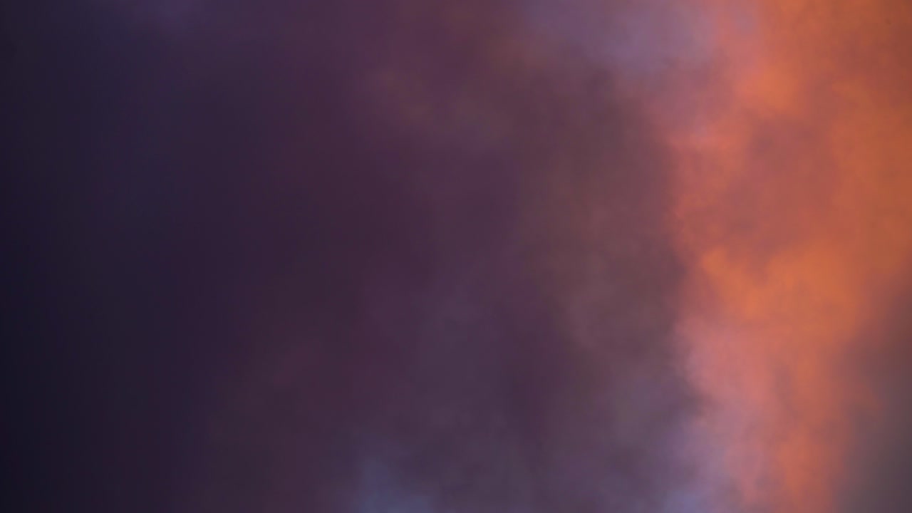 Fiery Telephoto Motion Cloudscape Moving Left to Right