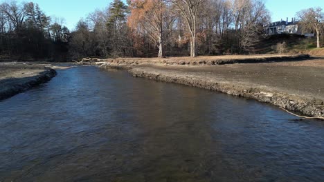 Drone-view-of-a-pond-flow-that-is-badly-eroded