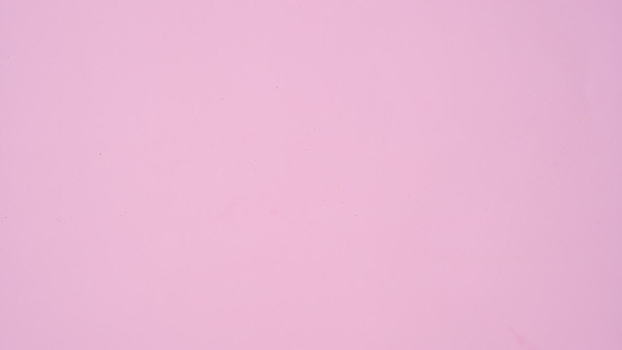 una columna de galletas redondas vienen en el tema rosa pastel claro. dejar de moverse plana