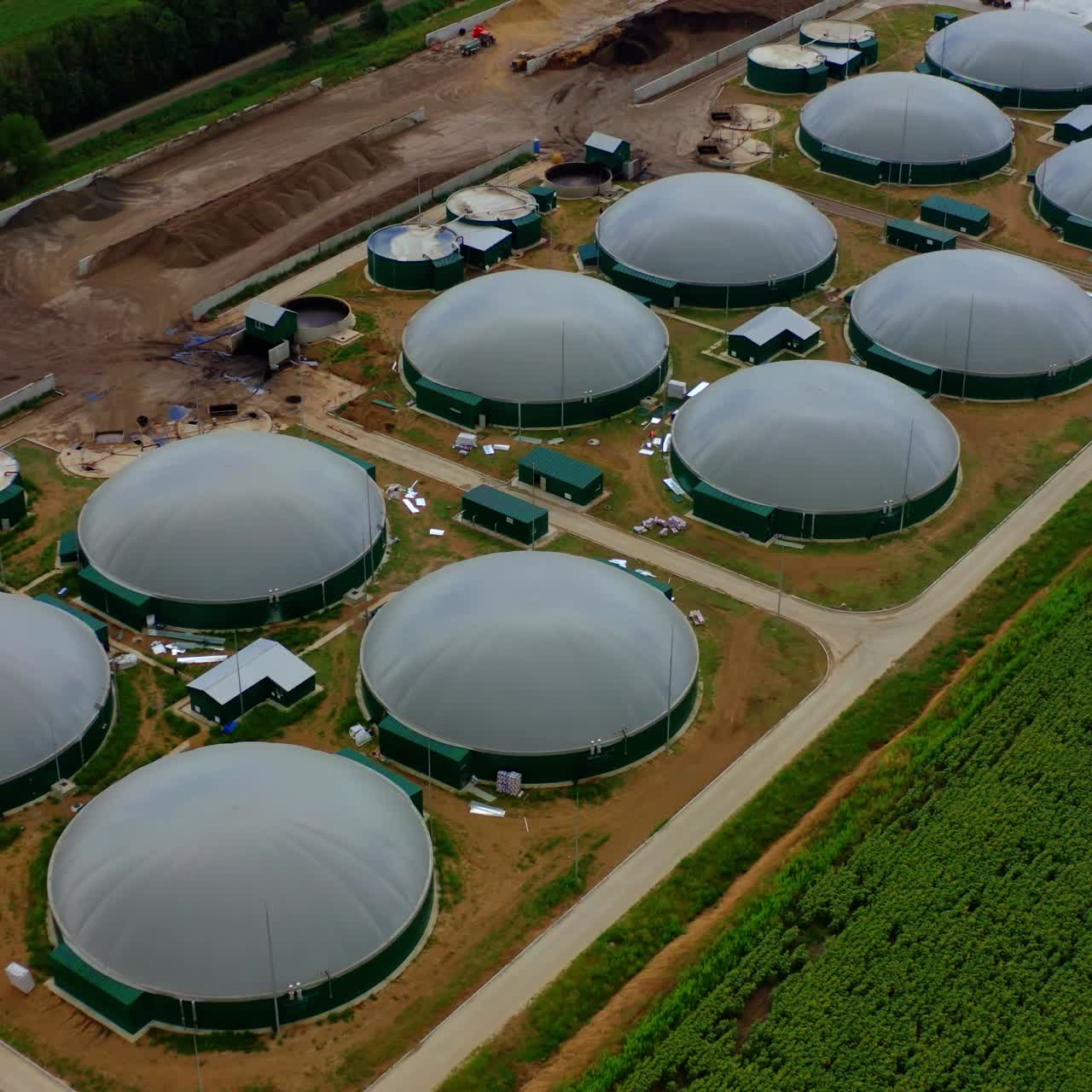 Modern biofuel factory. Aerial view on biofuel plant. Ecological production. Bio gas station. Video from above.
