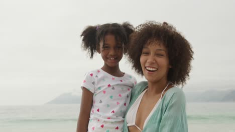 family enjoying free time by the sea