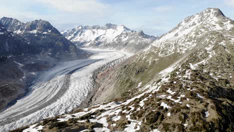 panoramic aerial view of the aletsch glacier in wallis, switzerland, which is the longest glacier of the swiss alps and europe with a spinning view of the surrounding peaks