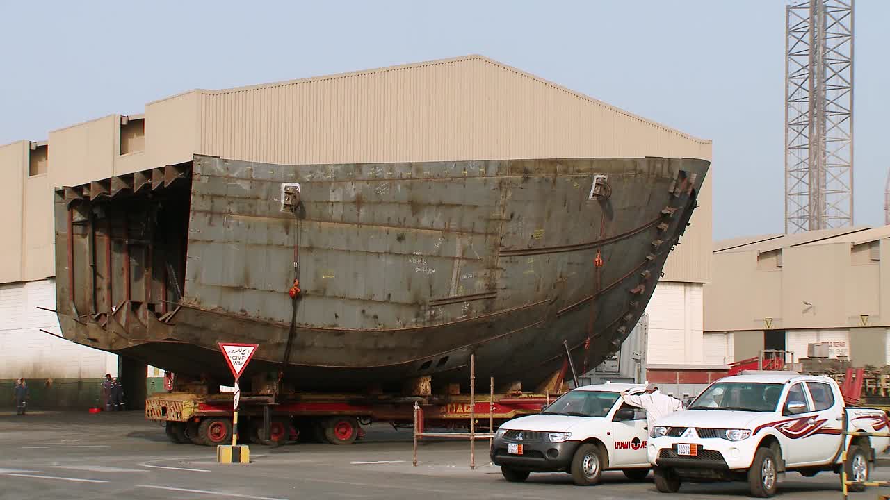 Ship bow being transported in ASRY ship repair yard and dry dock in Bahrain