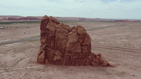 tall geological rock formation in southwest desert, arizona - aerial