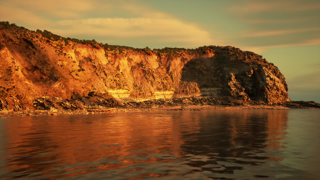Expansive aerial shot showcasing shining cliffs and tranquil sea