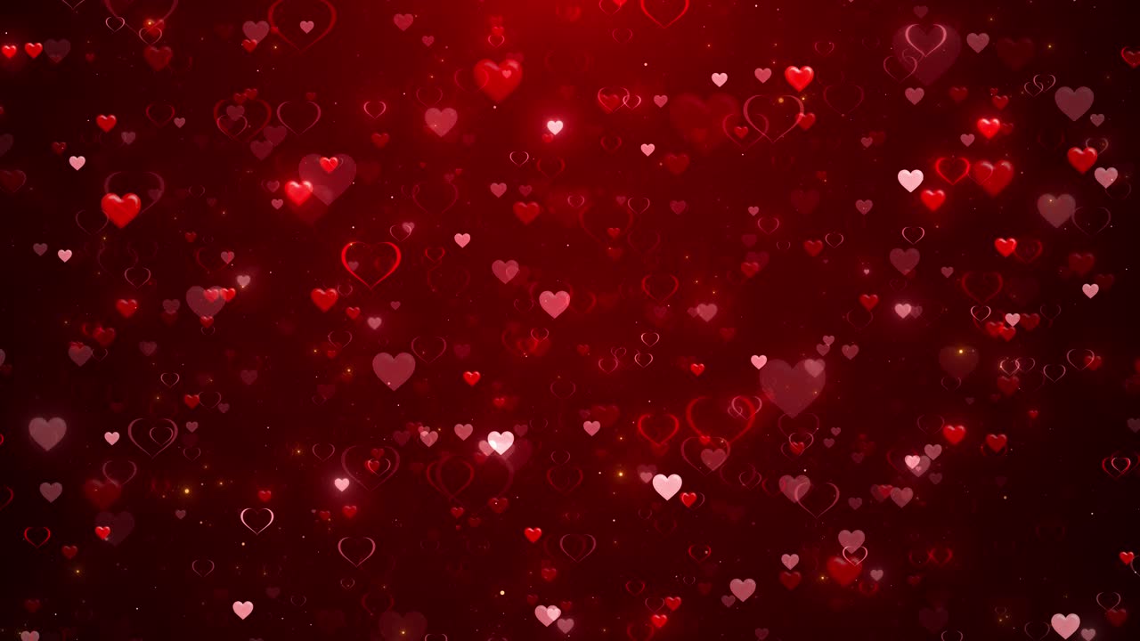 Sagome di cuori rossi scintillanti su sfondo scuro, romantico e d'amore