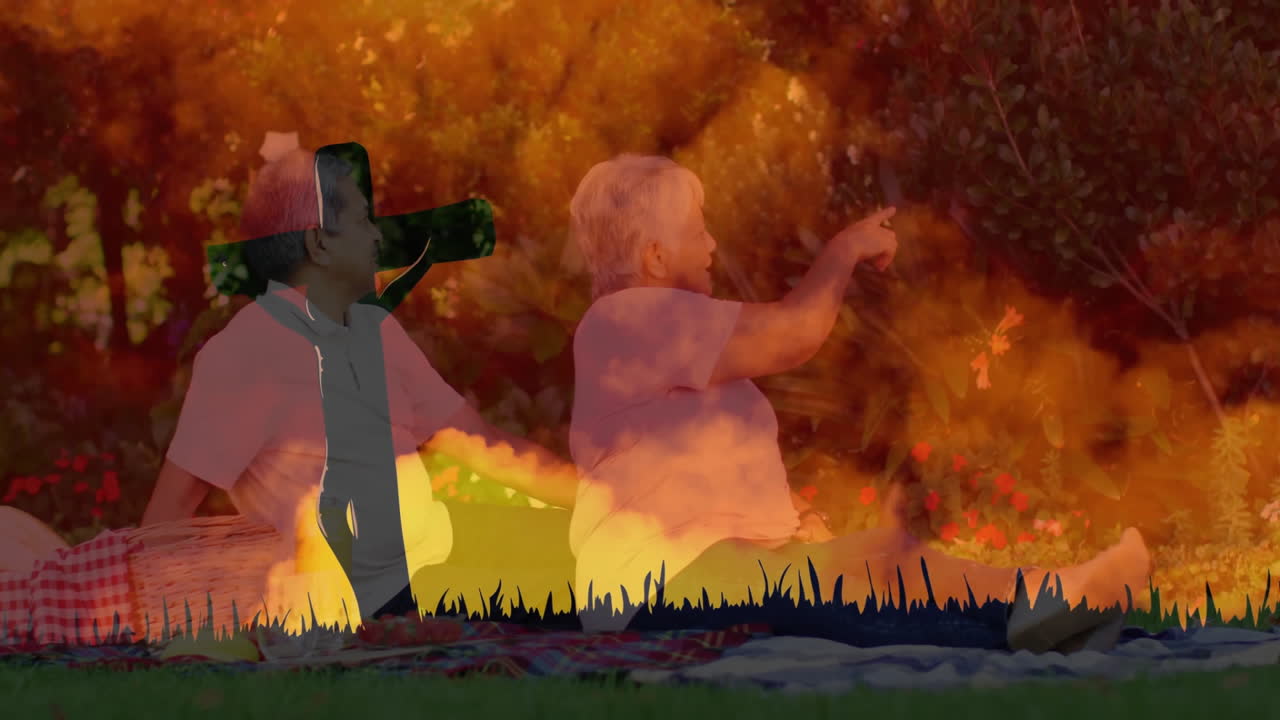 In autumn park, elderly couple walking with silhouette of person holding bottle