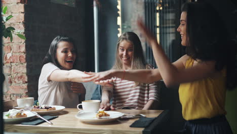 friends enjoying a cafe breakfast