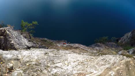 rock climber climbing the cliff 4k